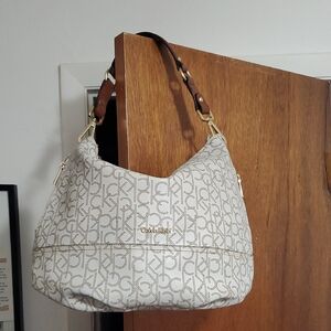 Calvin Klein Cream Monogram Hobo with Brown Strap